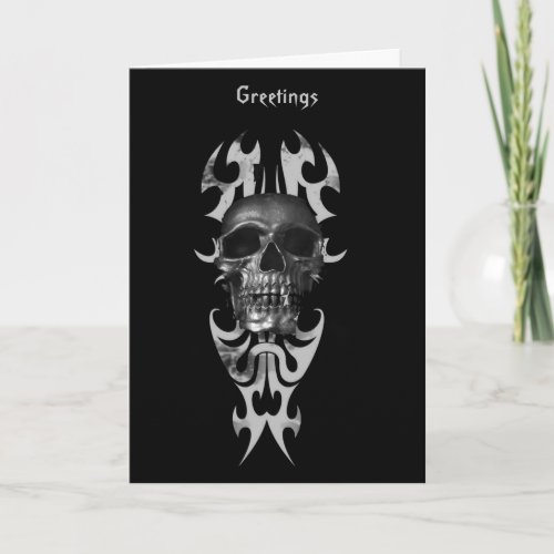 Metallic skull on tribal style pattern card