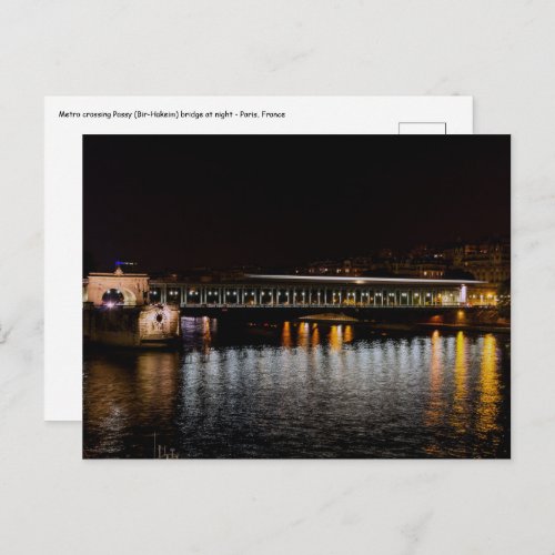 Metro crossing Bir_Hakeim bridge at night Postcard