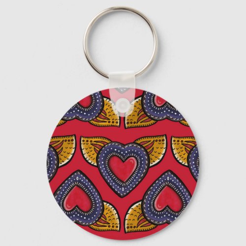 Mexican inspired winged hearts in milagro style keychain