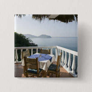 Mexico, Guerrero, Zihuatanejo. Cafe Table over Button