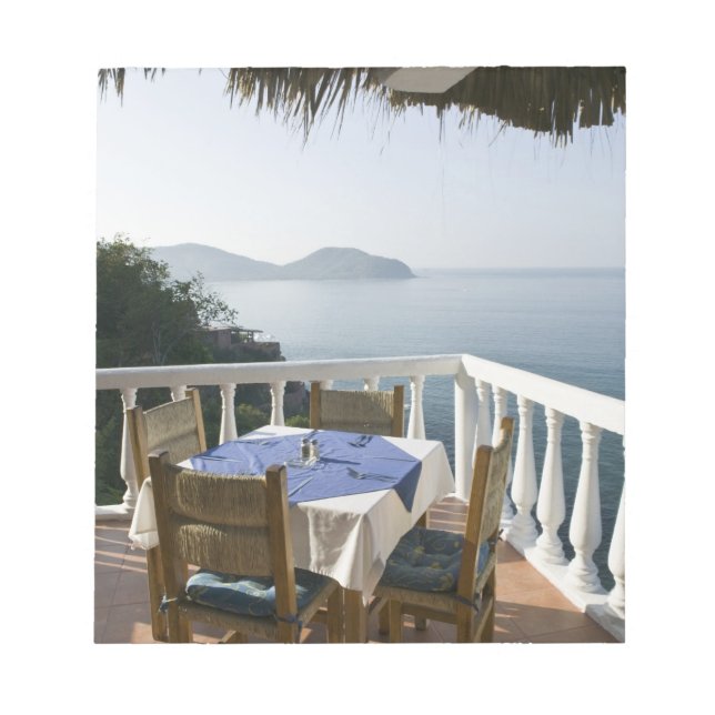Mexico, Guerrero, Zihuatanejo. Cafe Table over Notepad (Front)