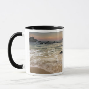 Mexico, Guerrero, Zihuatanejo. Surf along a Mug