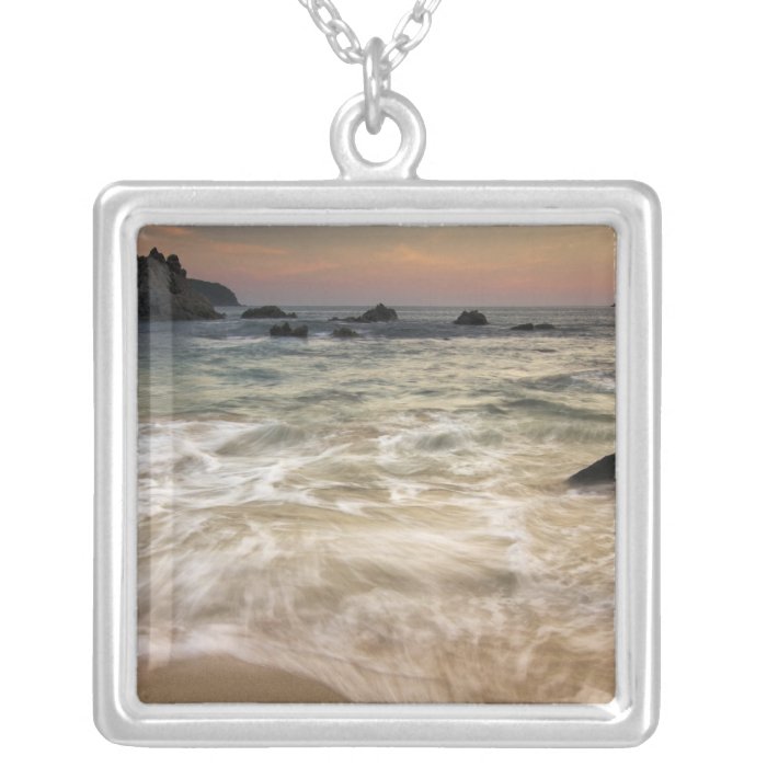 Mexico, Guerrero, Zihuatanejo.  Surf along a Custom Jewelry