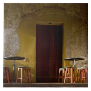 Mexico, Oaxaca, Afternoon sun lights balcony of Tile