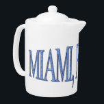 Miami, Florida - Blue Teapot<br><div class="desc">Featuring "Miami,  Florida" elegantly scripted in a striking blue hue,  this design captures the essence of sunny days and vibrant nightlife. Stand out in style while showcasing your love for this iconic city.</div>