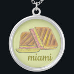 Miami Florida Ham Swiss Cheese Cuban Sandwich Silver Plated Necklace<br><div class="desc">Illustration features a delicious Cuban sandwich--a Miami, Florida favorite! This tasty pressed sandwich, a version of a classic ham and cheese, has Cuban bread, ham, Swiss cheese, pickles, mustard, and sometimes salami. Great for your favorite Floridian! This Cuban sandwich foodie design is also available on other products. Lots of other...</div>