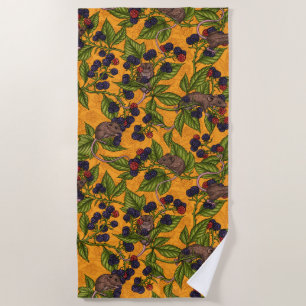 Mice and blackberries on yellow beach towel