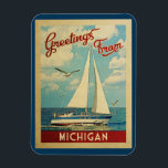 Michigan Sailboat Vintage Travel Magnet<br><div class="desc">This Greetings From Michigan vintage travel nautical design features a boat sailing on the water with seagulls and a blue sky filled with gorgeous puffy white clouds.</div>