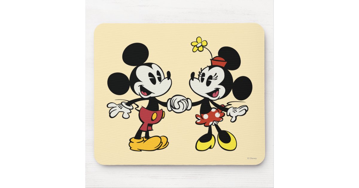 walt disney and mickey mouse holding hands
