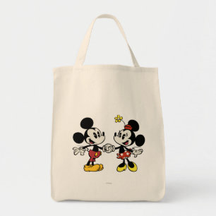 Mickey and Minnie Holding Hands Tote Bag