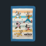 Mickey & Friends Retro Stars and Stripes Graphic Trifold Wallet<br><div class="desc">Get ready for adventure with the whole crew! This vibrant "Mickey and Friends" design features the iconic Fab Five—Mickey, Minnie, Donald, Goofy, and Pluto—striding forward in a classic, retro art style. Accented with playful stars and a backdrop of stylish, muted stripes, this graphic captures the timeless joy of Disney friendship....</div>