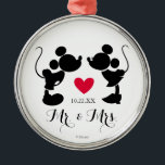 Mickey & Minnie Wedding | Silhouette Metal Ornament<br><div class="desc">Celebrate your love story with this elegant metal ornament featuring the iconic silhouettes of Mickey and Minnie Mouse in a romantic design. Perfect for Disney-loving couples, this customizable ornament makes a beautiful keepsake for weddings, engagements, or anniversaries. Add a personal touch to your holiday decor or gift it as a...</div>