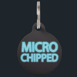 Microchipped Pet ID Tag<br><div class="desc">This is a great tag for any pet that has a microchip implanted. It is sure to let everyone know that they should be scanned immediately if found. Each of our dog tags for dogs are designed and illustrated by artists from all over the globe, and printed with affection and...</div>