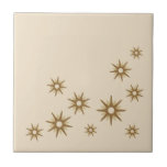 Mid-Century Gold Starburst Design Ceramic Tile<br><div class="desc">Mid-century modern inspired design featuring vintage retro gold starbursts in an organic design on a beige background. Simple,  clean modern design.</div>