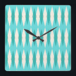 mid Century Modern Argyle Square Wall Clock<br><div class="desc">This Mid Century Modern Argyle Square Acrylic Wall Clock (small print) features a vibrant, turquoise background and a pattern of mod, translucent teal diamonds overlaying larger, vintage cream diamonds with gold colored, space age speckles. This minimalist inspired, deconstructed argyle is a simplistic throwback of the larger than life atomic era...</div>