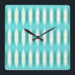mid Century Modern Argyle Square Wall Clock<br><div class="desc">This Mid Century Modern Argyle Square Acrylic Wall Clock (small print) features a vibrant, turquoise background and a pattern of mod, translucent teal diamonds overlaying larger, vintage cream diamonds with gold colored, space age speckles. This minimalist inspired, deconstructed argyle is a simplistic throwback of the larger than life atomic era...</div>