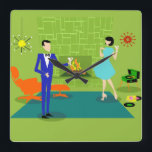 Mid Century Modern Couple Wall Clock<br><div class="desc">This Mid Century Modern Couple Acrylic Wall Clock looks like a scene out of a romantic comedy. The 1960's style, minimalist art design features an attractive cartoon couple enjoying a romantic evening at home. The sophisticated room prominently features a green stone wall with a roaring fire in the fireplace. The...</div>