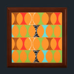 Mid Century Modern Orange Pattern Gift Box<br><div class="desc">Knock, knock. Who's there? Mid Century Modern Orange Pattern Gift Box! Hey, with a design this retro, you don't need a punch line. This perfectly mod pattern features a vibrant orange background and rows of an adorably kitschy shape in green, red, turquoise, black & white, and wood grain. The shape...</div>
