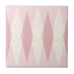 Mid Century Modern Pink Argyle Small Ceramic Tile<br><div class="desc">This Mid Century Modern Pink Argyle Small Ceramic Tile (large print) features a First Lady pink background and a pattern of mod, translucent, blush diamonds overlaying larger, vintage cream diamonds with gold colored, space age speckles. This minimalist inspired, deconstructed argyle is a simplistic throwback of the larger than life atomic...</div>