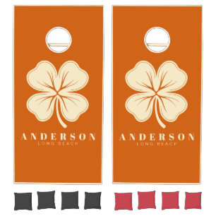 Mid-Century Pumpkin Four Leaf Clover with Name Cornhole Set