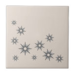 Mid-Century Silver Starbursts Ceramic Tile<br><div class="desc">Mid-century modern inspired design featuring vintage retro silver starbursts in an organic design on a light bone-colored background. Simple,  clean modern design.</div>