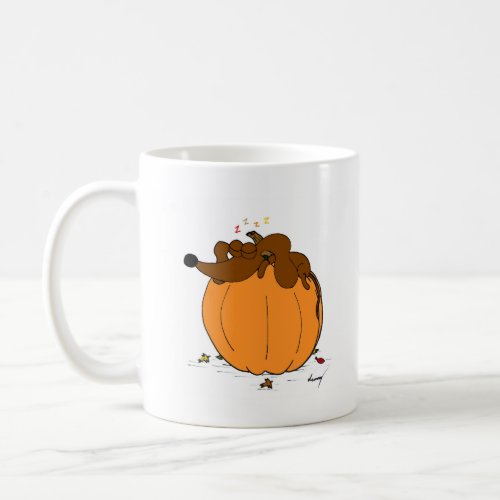 Midge Sleeping on a Pumpkin Mug