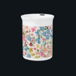 Midsummer meadow, blooming plant pattern. beverage pitcher<br><div class="desc">Blooming midsummer meadow seamless pattern. Plant background for fashion, wallpapers, print. A lot of different flowers on the field. Liberty style millefleurs. Trendy floral design Meadow of Dreams: Vintage Blooms in Harmonious Dance. Midsummer meadow blooms: Liberty style meets nature's canvas. ditsy, vintage, daisy, blue, retro, rose, summer, garden, baby, yellow,...</div>