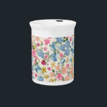 Midsummer meadow, blooming plant pattern. beverage pitcher<br><div class="desc">Blooming midsummer meadow seamless pattern. Plant background for fashion, wallpapers, print. A lot of different flowers on the field. Liberty style millefleurs. Trendy floral design Meadow of Dreams: Vintage Blooms in Harmonious Dance. Midsummer meadow blooms: Liberty style meets nature's canvas. ditsy, vintage, daisy, blue, retro, rose, summer, garden, baby, yellow,...</div>