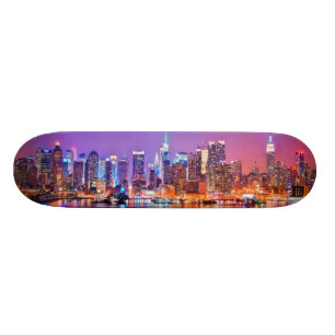Midtown Manhattan at night with Empire Stae Skateboard Deck