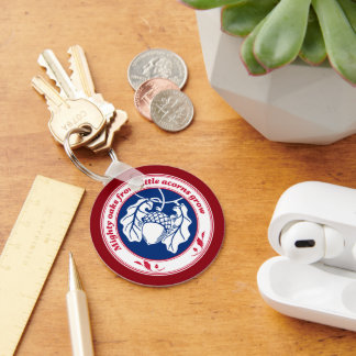 Mighty oaks from little acorns grow on deep red keychain