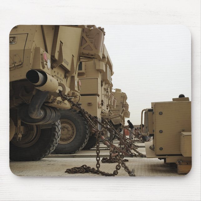 Military vehicles are locked down on semi truck mouse pad (Front)
