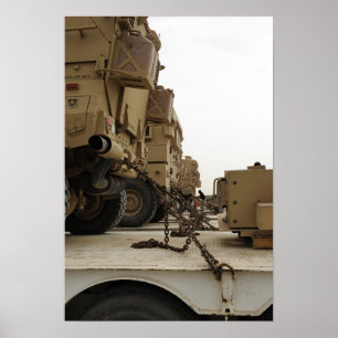 Military vehicles are locked down on semi truck poster