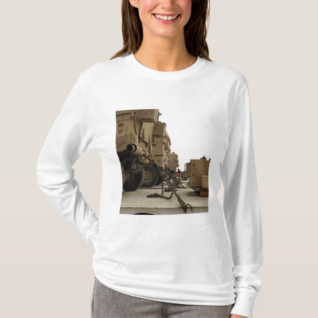 Military vehicles are locked down on semi truck T-Shirt (Front)