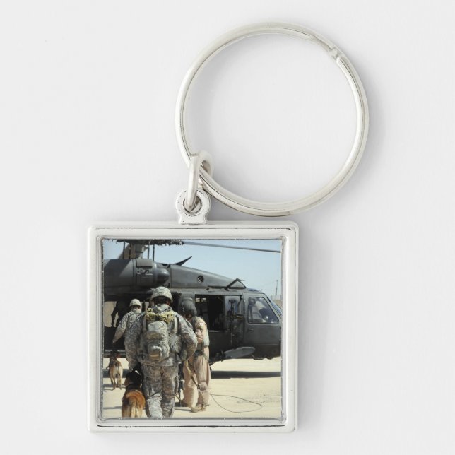 Military working dog handlers board a helicopte keychain (Front)