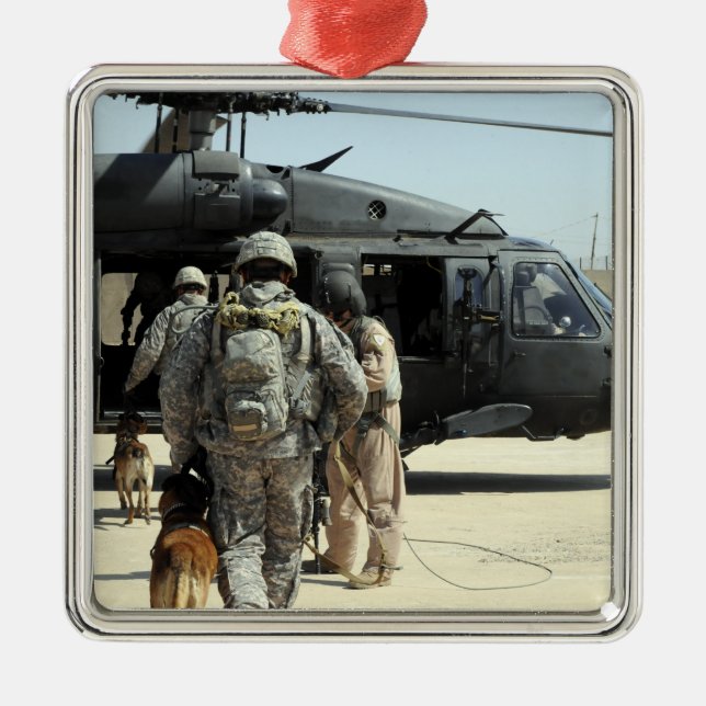 Military working dog handlers board a helicopte metal ornament (Front)