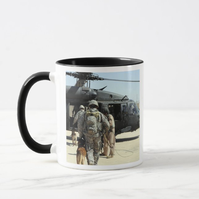 Military working dog handlers board a helicopte mug (Left)