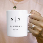 Minimal and Chic | Couples Monogram Wedding Date Coffee Mug<br><div class="desc">This elegant,  modern mug features a simple black and white text design that exudes minimalist style. Add your initials or monogram,  your last name,  and your wedding date or other special date to make them completely your own.</div>