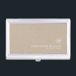 Minimal Beige Classic Monogram Business Card Case<br><div class="desc">Minimalist monogram design with classic block monogram medallion in a classic font with personalized name and title below on a simple beige background. Personalize for your custom use.</div>