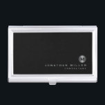 Minimal Black Silver Monogram Business Card Case<br><div class="desc">Minimalist monogram design with classic block typography silver brushed metal monogram medallion with personalized name and title or custom text below on a simple black background. Personalize for your custom use.</div>