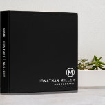 Minimal Classic Black White Monogram<br><div class="desc">Professional monogrammed binder features a modern minimalist design in black and white. Custom name presented in the lower right-hand corner in stylish simple font with a complimentary minimal monogram medallion. A modern binder for home or office, a professional monogrammed binder for your workspace. Ideal for consultants, attorneys, real estate agents,...</div>