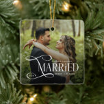 Minimal First Christmas Married Couples 2 Photos Ceramic Ornament<br><div class="desc">Celebrate your first Christmas as a married couple with the Minimal First Christmas Married Couples 2 Photos Ceramic Ornament. Featuring a clean, modern design that highlights your favorite wedding photo, this timeless keepsake adds a personal and elegant touch to your holiday décor. Perfect for commemorating newlyweds’ first Christmas together or...</div>