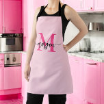 Minimal Hot Pink Modern Typographic Monogram Apron<br><div class="desc">Elevate your kitchen style with our Minimal Hot Pink Modern Typographic Monogram Apron! Featuring a sleek, minimalistic design in bold hot pink, this apron is personalized with your monogram in a modern typographic font. Perfect for cooking, baking, or grilling, it combines fashion and function with adjustable straps and durable fabric....</div>