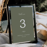 Minimal Leaf | Dark Green Wedding Table Number<br><div class="desc">This minimal leaf dark green wedding table number is perfect for a boho wedding. The design features a simple greenery leaf silhouette in olive green with minimalist mountain bohemian style. The card prints on the front and back (double-sided). Items are printed exactly as they appear on your screen when you...</div>