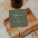 Minimal Leaf | Dark Green Wedding Welcome Square Sticker<br><div class="desc">These minimal leaf dark green wedding welcome stickers are perfect for a boho wedding. The design features a simple greenery leaf silhouette in olive green with minimalist mountain bohemian style. Personalize these stickers with the location of your wedding, names, and wedding date. These labels are perfect for destination weddings and...</div>
