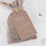 Minimal Leaf Neutral Wedding Welcome Gift Tags<br><div class="desc">These minimal leaf neutral wedding welcome gift tags are perfect for a boho wedding. The design features a simple greenery leaf silhouette in an earthy natural tone with minimalist desert bohemian style. Personalize the tags with the location of your wedding, a short welcome note, your names, and wedding date. These...</div>