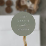 Minimal Leaf | Sage Green Wedding Envelope Seals<br><div class="desc">These minimal leaf sage green wedding envelope seals are perfect for a boho wedding. The design features a simple greenery leaf silhouette in a dusty green color with minimalist mountain boho style. Personalize the label with the names of the couple.</div>