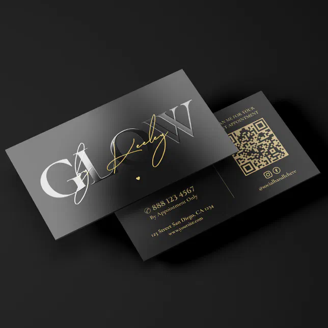 A modern, luxury business card set against a dark black background with Spot UV elements and a gold cursive script signature overlay.