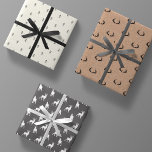 Minimal Masculine Kraft Black White Grey Christmas Wrapping Paper Sheets<br><div class="desc">the ultimate gentleman's christmas gift wrapping paper pack. includes 3 sheets with three different designs. 1.) rustic brown organic kraft paper print with black deer antlers,  2.) antique ivory with black minimalist simple stick figure xmas trees 3.) charcoal grey with white reindeer silhouettes.</div>