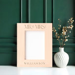 Minimal Mr & Mrs Newlyweds Wedding Gift Keepsake Engraved Frames<br><div class="desc">Celebrate the union of two hearts with our Minimal Mr & Mrs. Newlyweds Wedding Gift Keepsake Etched Frame. Featuring sleek "MR & MRS" typography, this elegantly designed frame captures the essence of modern romance. Personalize it with the couple's last name and the year of their marriage, beautifully etched to create...</div>