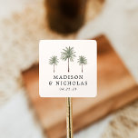 Minimal Palm Trees Personalized Wedding Square Sticker<br><div class="desc">Seal your wedding invitations and favors with these personalized palm tree stickers. The tropical wedding stickers feature three palm trees with your names and wedding date displayed below in black lettering on an ivory background. The palm tree wedding stickers were designed to coordinate with our Minimal Palm Tree wedding collection....</div>